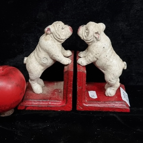 273 - A pair of cast metal bookends in the form of Pitbulls.