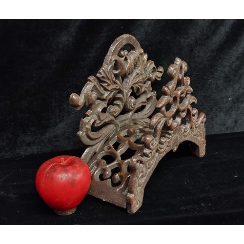 289 - A heavy cast metal garden hose holder with a foliate design.