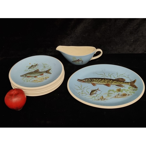 290 - Eight lovely Fish, Polo Murch Greasley Potteries items including a gravy boat and plates featuring a... 