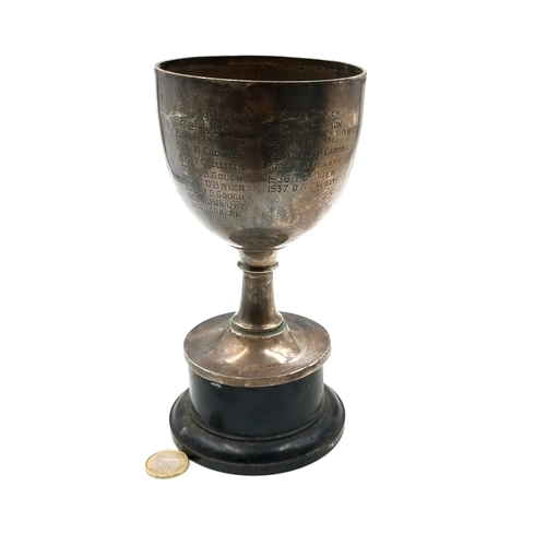 897 - A vintage Birmingham sterling silver trophy dated to c. 1937. With an inscription dedicated to the m... 