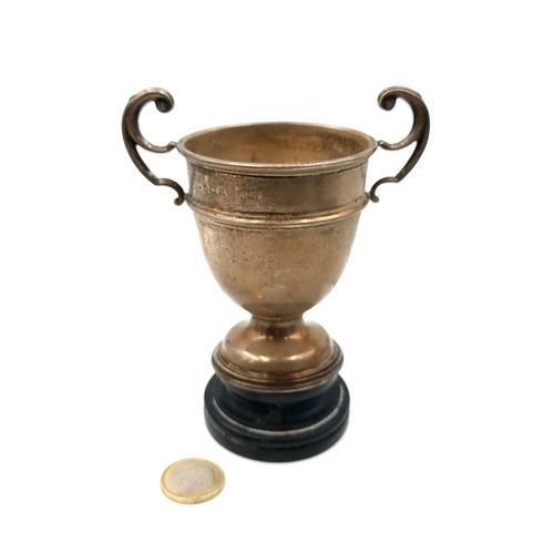 900 - A vintage Birmingham sterling silver trophy. Accompanied by pedestal. Weight: 90.39g