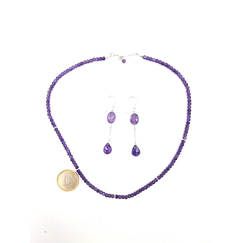 910 - A very handsome Amethyst  necklace and matching earrings with Sterling Silver mounts. Brand new from... 