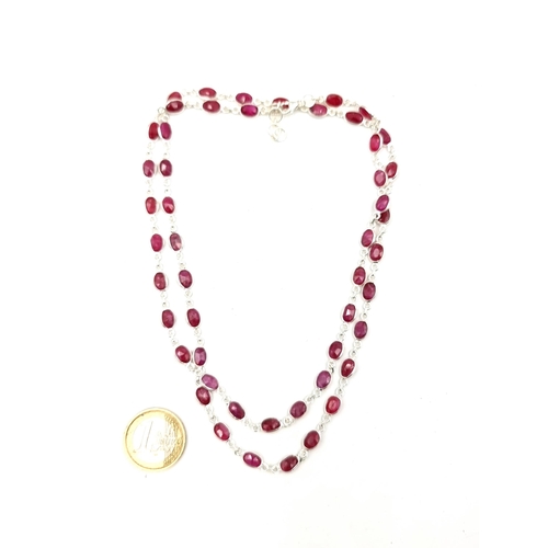 911 - A lovey long genuine Ruby and Sterling Silver Necklace, 50 matched rubies. Approx 70cm long. Lovely ... 