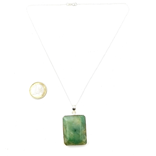 914 - A lovey long large jade pendent Necklace, With a large rectangular stone and Sterling Silver fine ch... 