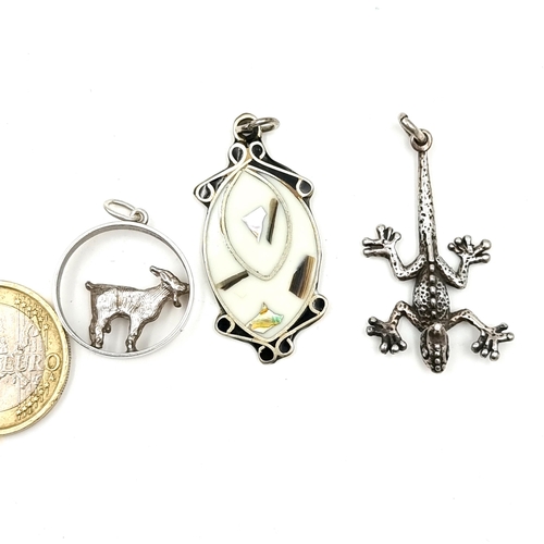 923 - Three Sterling Silver animal themed pendents inc a lizard fish and goat. 15g