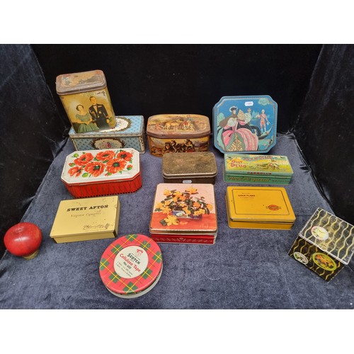 945 - A selection of 12 vintage tins including Mick Mcquid cut plug etc