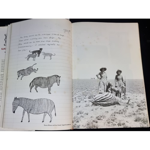 184 - A first edition hardback book titled 'Longing for Darkness Kamate's Tales from Out of Africa' collec... 