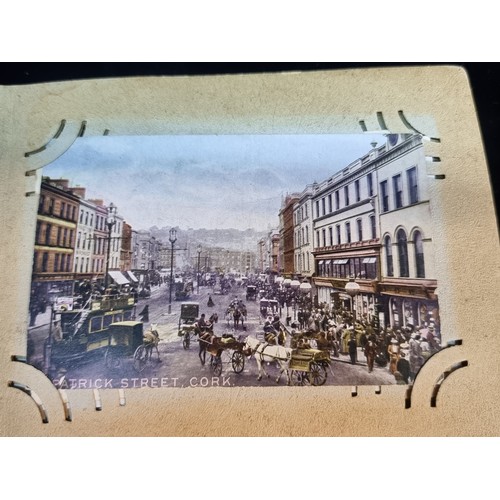 190 - A vintage album containing approx. 39 vintage postcards including Irish examples from Dublin, Cork a... 