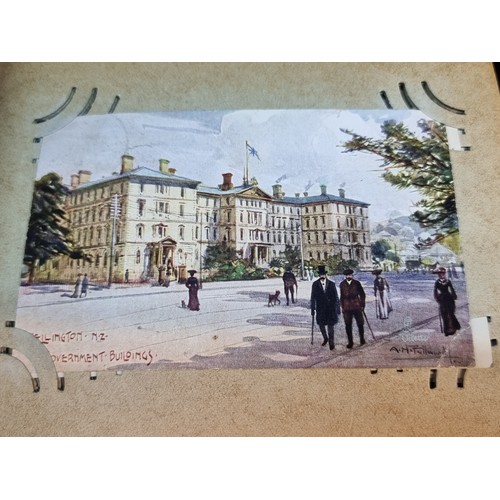 190 - A vintage album containing approx. 39 vintage postcards including Irish examples from Dublin, Cork a... 