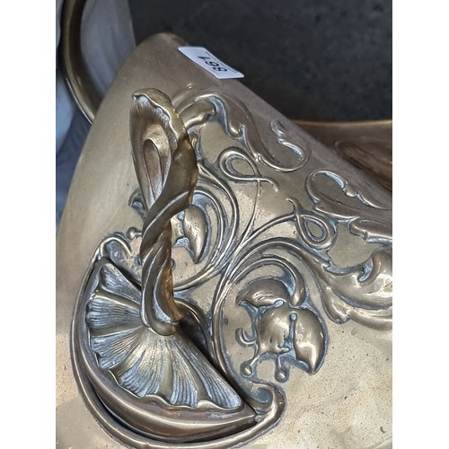 861 - Star Lot : A fabulous elegant art Nouveau helmet brass coal scuttle with a matching shovel held insi... 