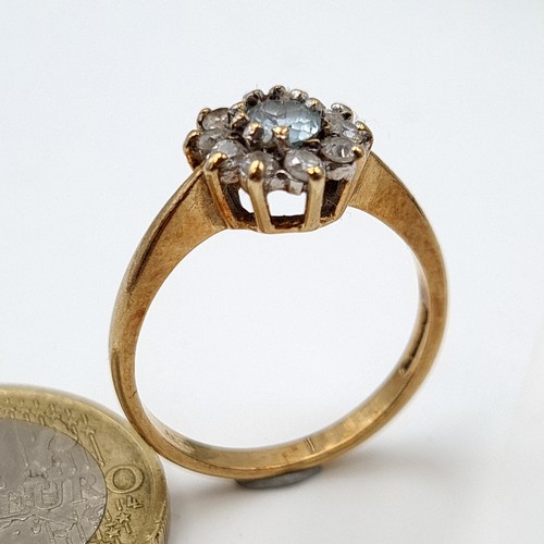 2 - Star Lot : An unusual antique 9 carat gold Aquamarine floral cluster ring, set beautifully with a sp... 