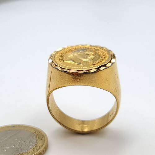 3 - A striking heavy, wide banded Napoleonic III large gold signet ring, set with diamond cut surround. ... 