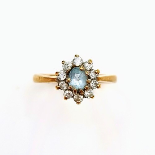 2 - Star Lot : An unusual antique 9 carat gold Aquamarine floral cluster ring, set beautifully with a sp... 