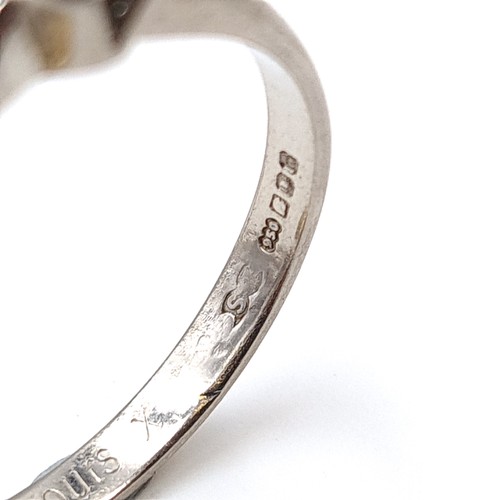 12 - Star Lot : A fine example of a platinum Diamond Solitaire ring, set with loving inscription 