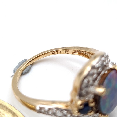 15 - Star Lot : A fabulous example of a vintage 10 carat gold generous Blue fire Opal stone ring, set wit... 