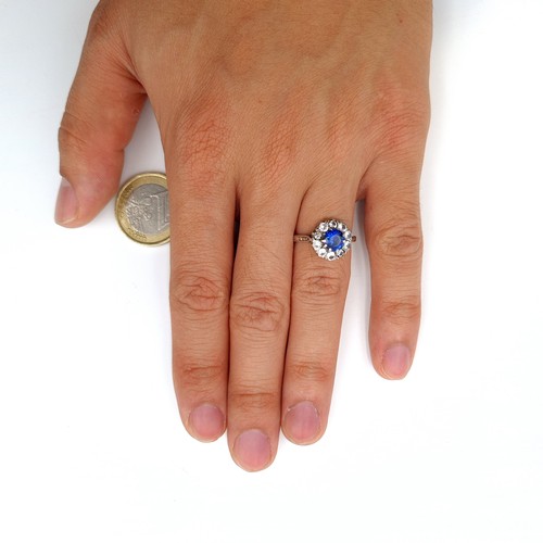 18 - Star Lot: An expertly crafted 18 carat gold Sapphire and diamond ring,  Stamped 18ct. Ring size: L. ... 