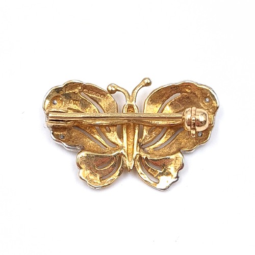 21 - A very pretty intricately formed 9 carat Gold butterfly brooch, set with beautiful White Gold detail... 