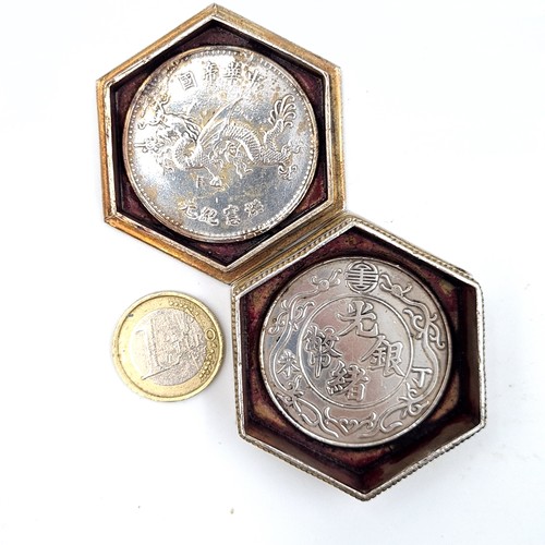 42 - An unusual Chinese hexagonal embossed pill box, set with profuse swirling dragons and dotted motif. ... 