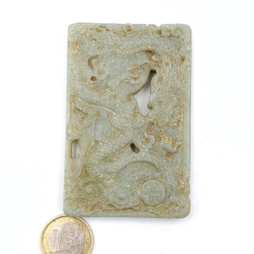 43 - A heavy antique natural Jade tablet, featuring a Buddha hand carved design. Dimensions: 8.5cm. Weigh... 