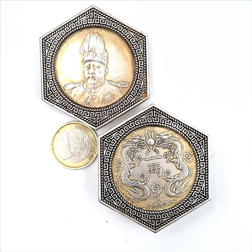 42 - An unusual Chinese hexagonal embossed pill box, set with profuse swirling dragons and dotted motif. ... 