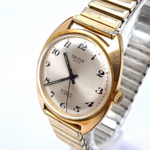 An Oriosa 17 jewelled incabloc vintage gold toned wrist watch featuring luminous hands and sweep se