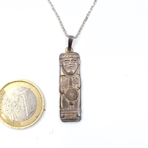 54 - A sterling silver very unusual ingot with a warrior with shield and badge and chain. Length of chain... 