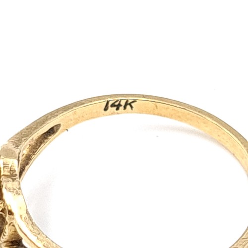 56 - A stunning 14 carat gold ring., set with a pretty heart shaped shield design. Ring size: J. Weight: ... 