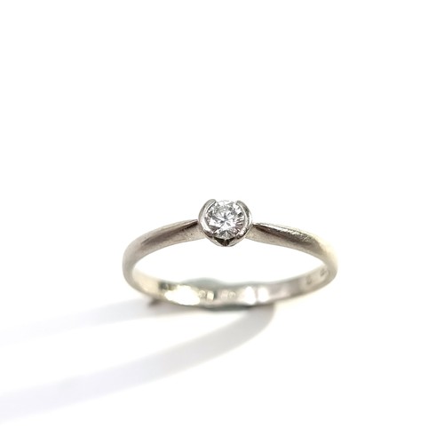 12 - Star Lot : A fine example of a platinum Diamond Solitaire ring, set with loving inscription 