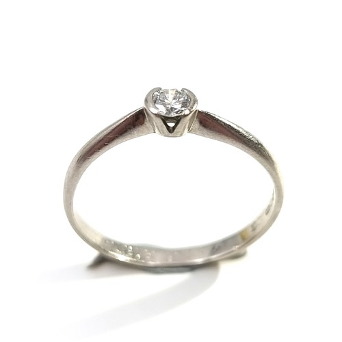 12 - Star Lot : A fine example of a platinum Diamond Solitaire ring, set with loving inscription 