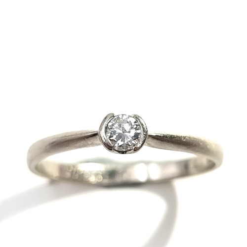 12 - Star Lot : A fine example of a platinum Diamond Solitaire ring, set with loving inscription 