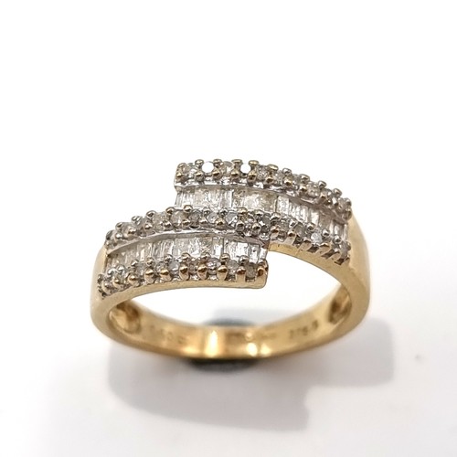 17 - Star Lot: An impressive vari cut Diamond 9 carat gold ring, set beautifully with a contemporary styl... 