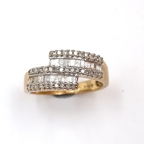 17 - Star Lot: An impressive vari cut Diamond 9 carat gold ring, set beautifully with a contemporary styl... 