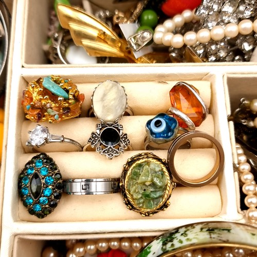 49 - A fabulous large collection of assorted jewellery, contents as photographed and unchecked. Encased i... 