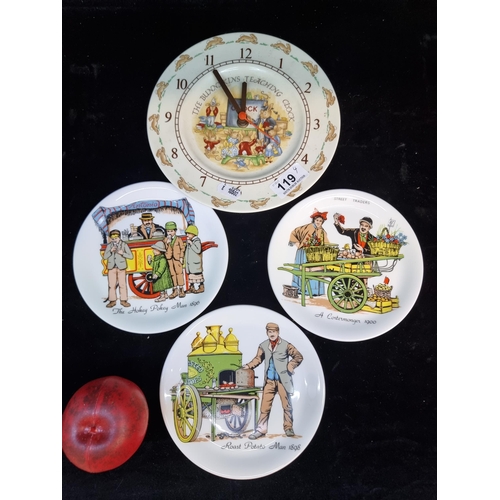 119 - A Royal Doulton 'Bunnykins' wall clock along with three matching Fine Bone China Plates featuring va... 