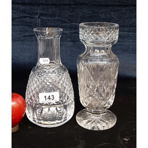 143 - Two Waterford Crystal vases, both in good condition and with acid mark to base.