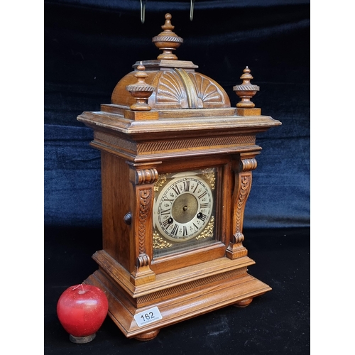 162 - A fabulous large antique mantle clock with wonderful roman numeral dial, three finials to top and bl... 