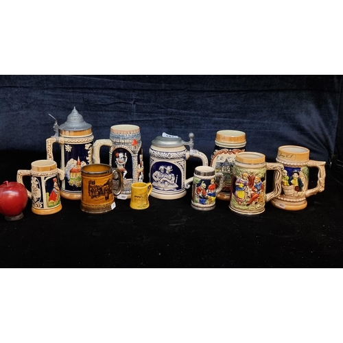 181 - A selection of ten vintage German steins including two lidded examples.