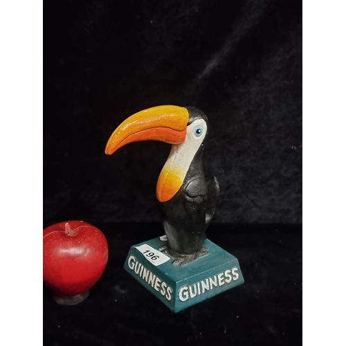 196 - A heavy cast metal Guinness advertising figure of a toucan.