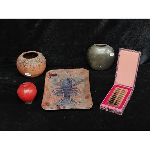 216 - Four items including Irish made enamel on copper plate with a lobster design, two hand made bud vase... 