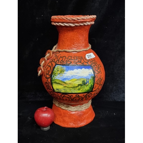 231 - A wonderful large handmade papier mache urn by Irish artist Margaret Kennedy, with painted country s... 