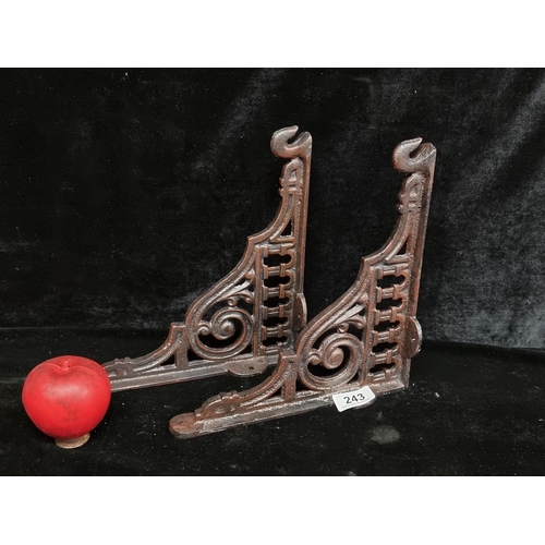 243 - A pair of heavy cast metal brackets to be used either as plant hangers or shelf supports. With lovel... 