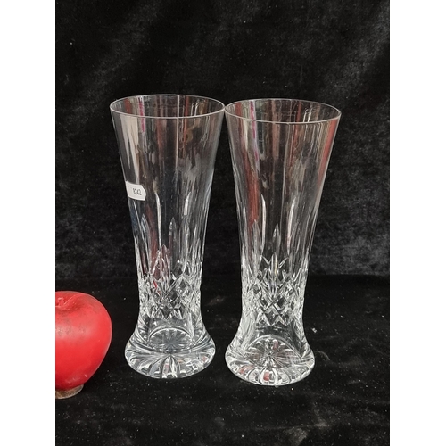 258 - Two matching Waterford Crystal vases in the Lismore pattern. In very good condition and with marks t... 