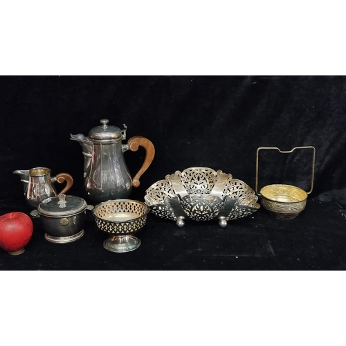 264 - Silver plated items including including a coffee pot with a wooden handle, a fruit bowl with pierced... 