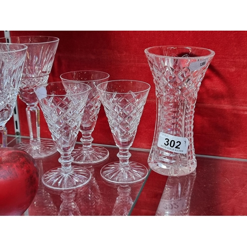 302 - A collection of Waterford Crystal items, including a beautiful neat sized Waterford Crystal vase/win... 