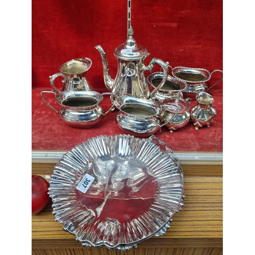 307 - A large collection of nine vintage old Sheffield silver plated items, by Viners of Sheffield. This i... 