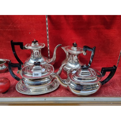 308 - A stylish five piece silver plated tea set by Viners of Sheffield. Each item is set with bulbous gra... 