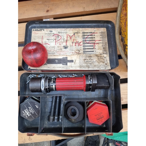 364 - A cased Hilti DX 100-L piston drive fastener DX100L power actuated tool set, featuring original case... 