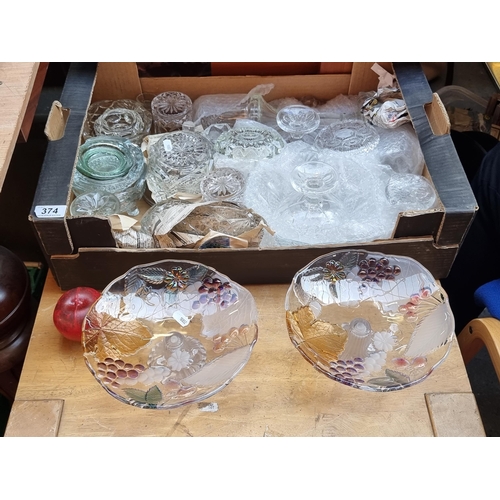 374 - A box containing approx. 28 glass items including two colourful stemmed cake stands.