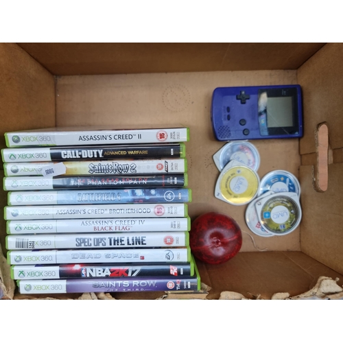 381 - A box containing gaming items including eleven XBox 360 games such as Assassin's Creed 2 and Call of... 