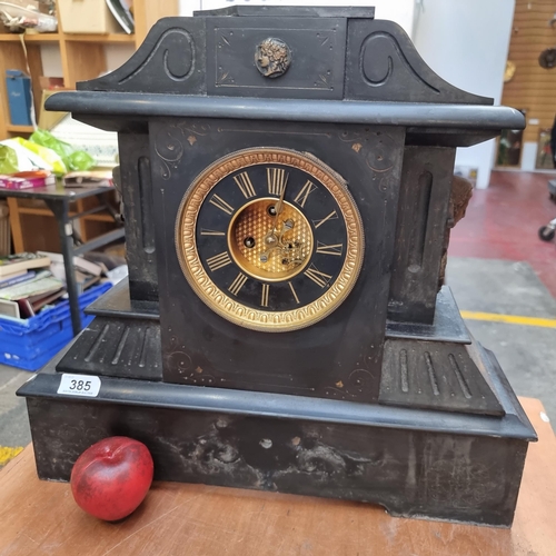 385 - A fabulous huge 19th century slate French made 8-day mantle clock from J. Marti. Featuring mask deta... 